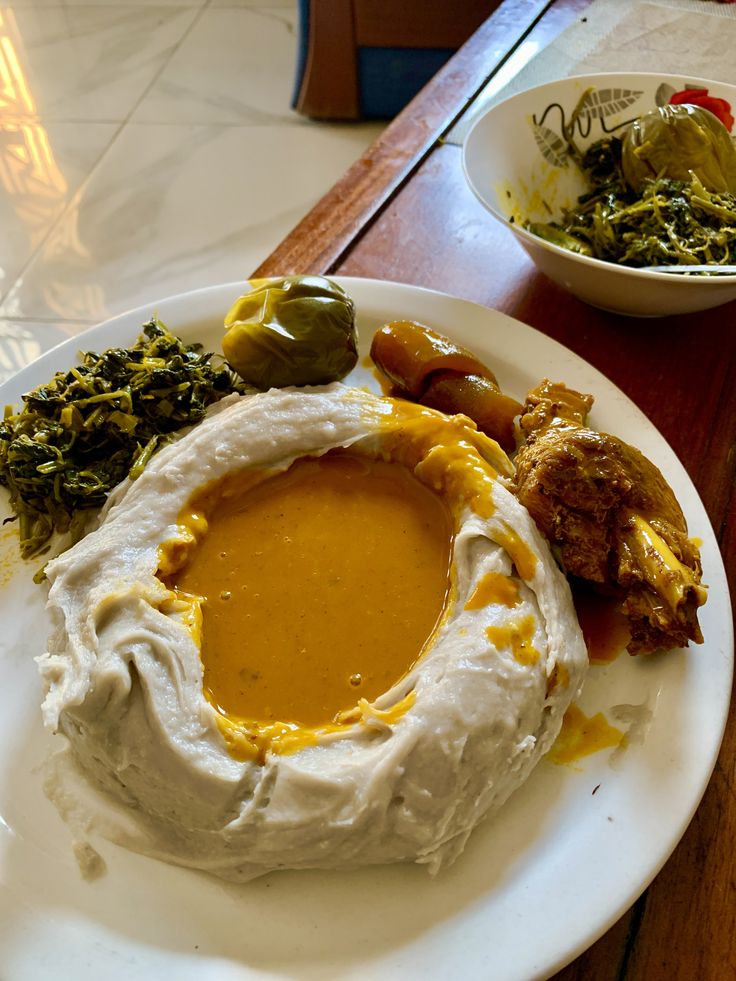 Assiette d’Achu et sa sauce jaune, photo du plat partagée par Coin Chaleureux
